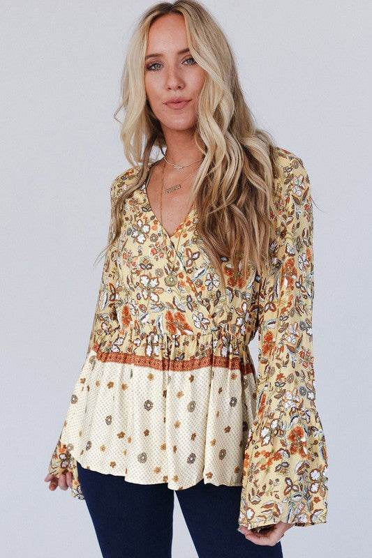Floral V Neck Wrapped Contrast Peplum Blouse