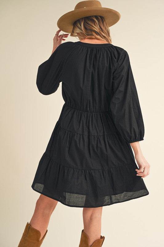 Aemi + Co Notched Balloon Sleeve Tiered Mini Dress