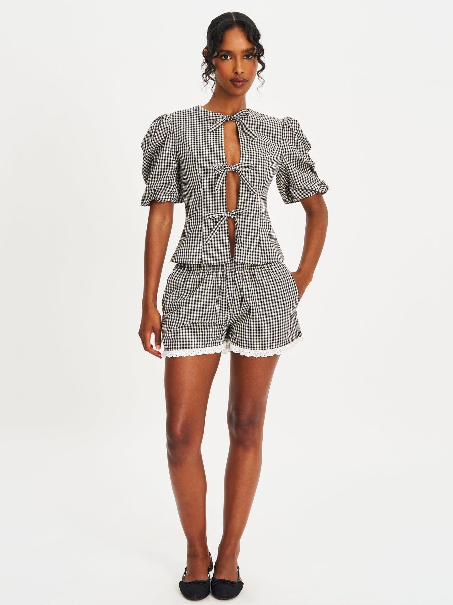 Qusayla Black Gingham Bubble Sleeve Bowtie Top