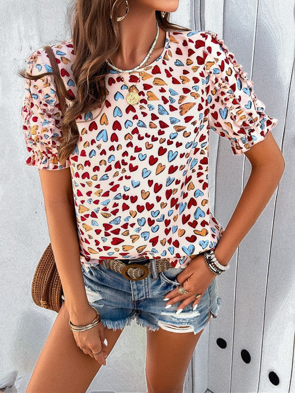 Round neck heart print ruffled sleeve top