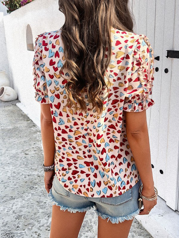 Round neck heart print ruffled sleeve top