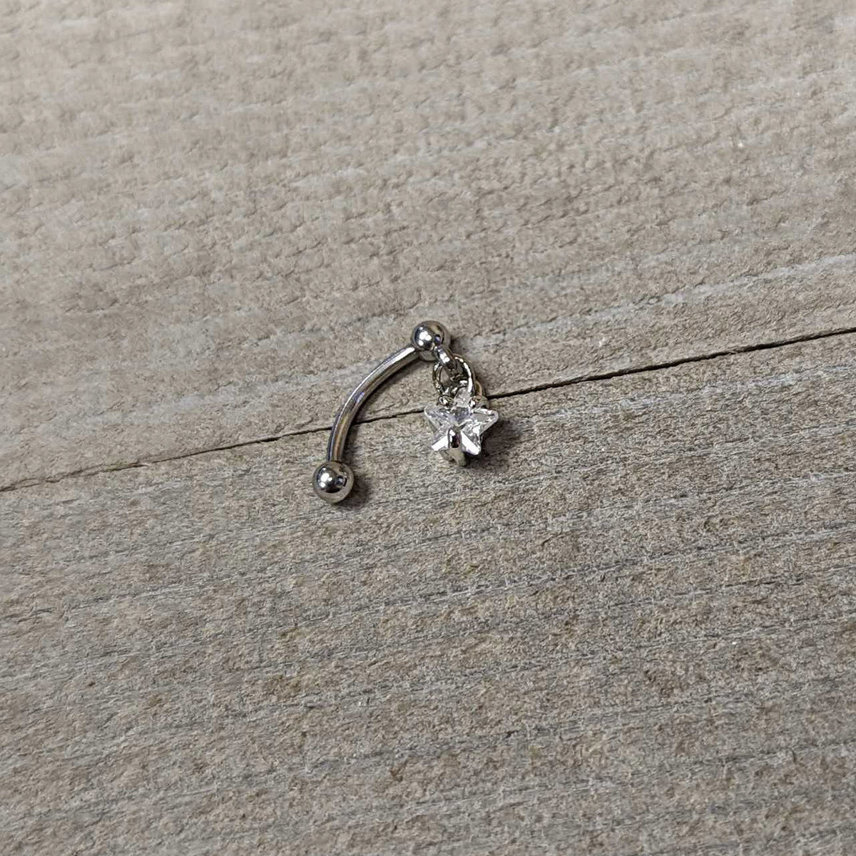 Top Down Clear Gem Dangle Star Eyebrow Ring