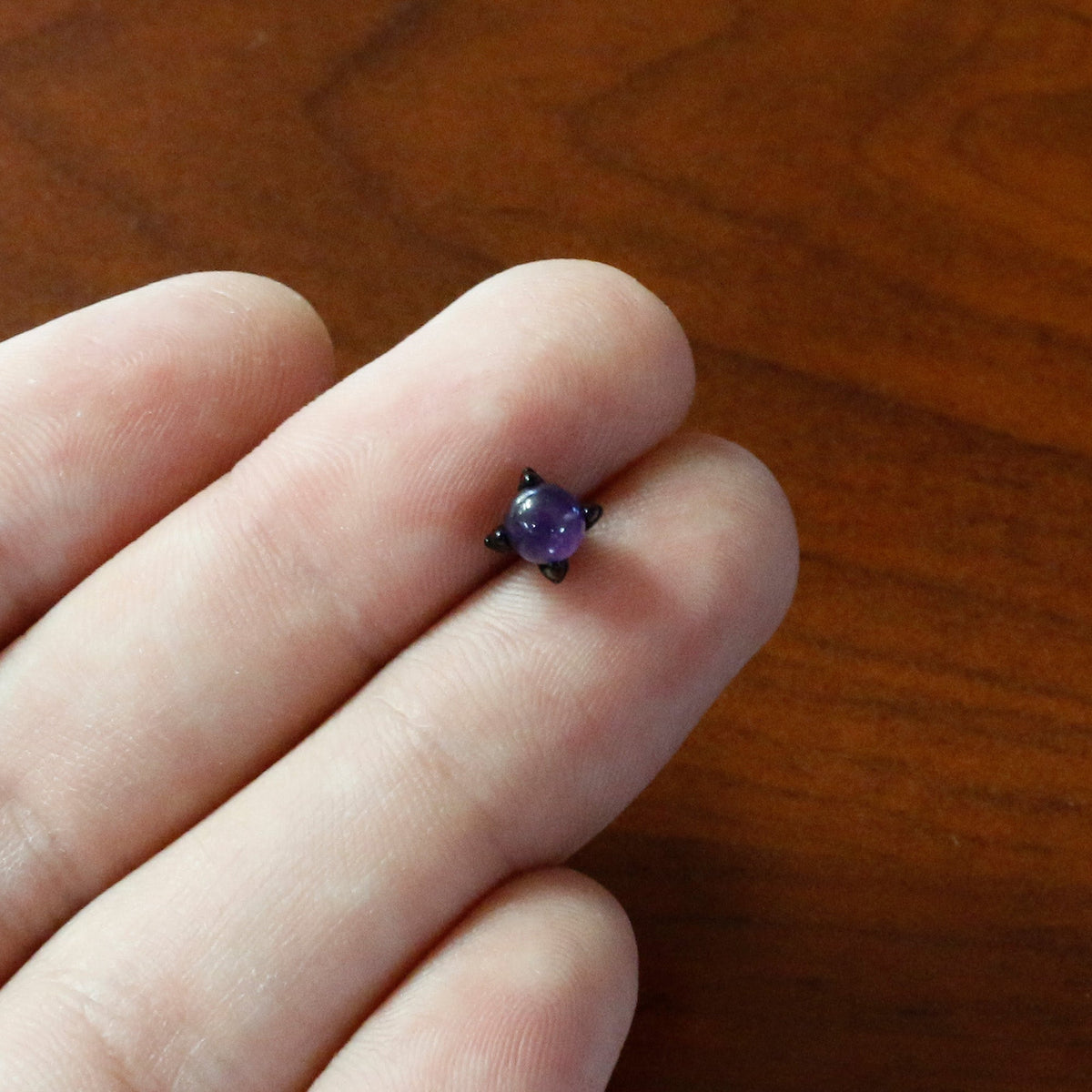20G 1/4 Purple Synthetic Amethyst Black Claw Hand Nose Bone