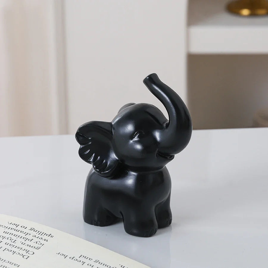 1pc Collectible figurine  , Simple modern black and gold elephant ornament home decor small sculpture.
