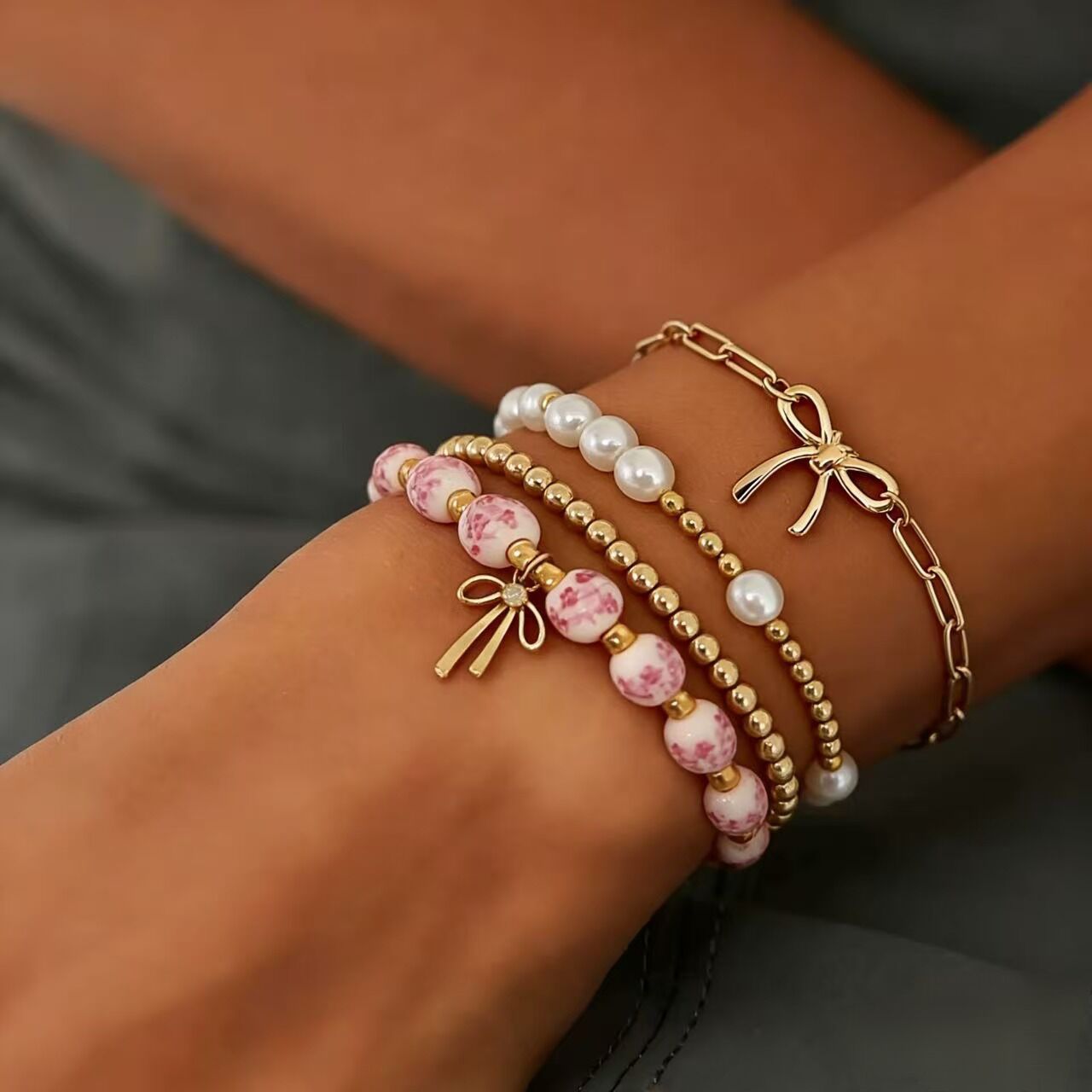 Minimalist Bow Pendant Bracelet with Pearl Accents