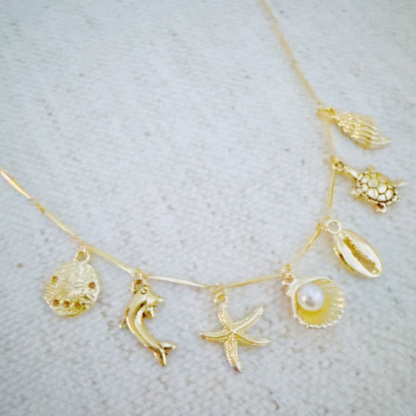 Golden Sea Charm Necklace – Shell, Dolphin & Starf