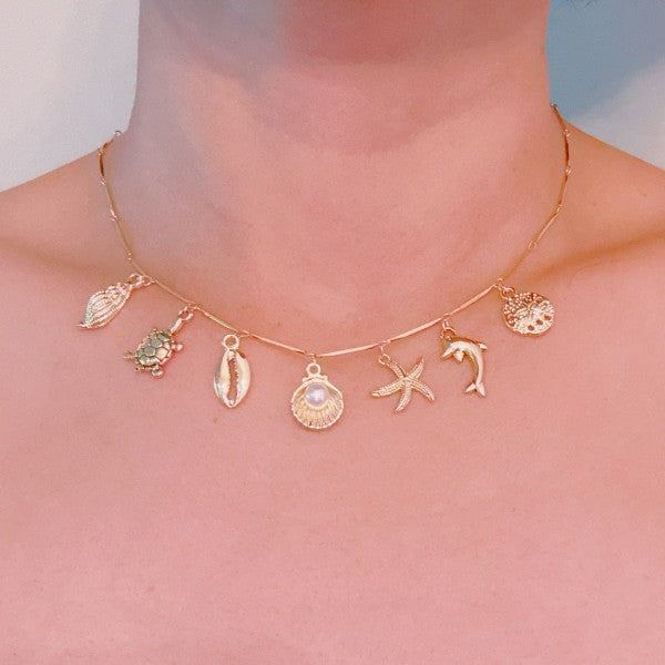 Golden Sea Charm Necklace – Shell, Dolphin & Starf