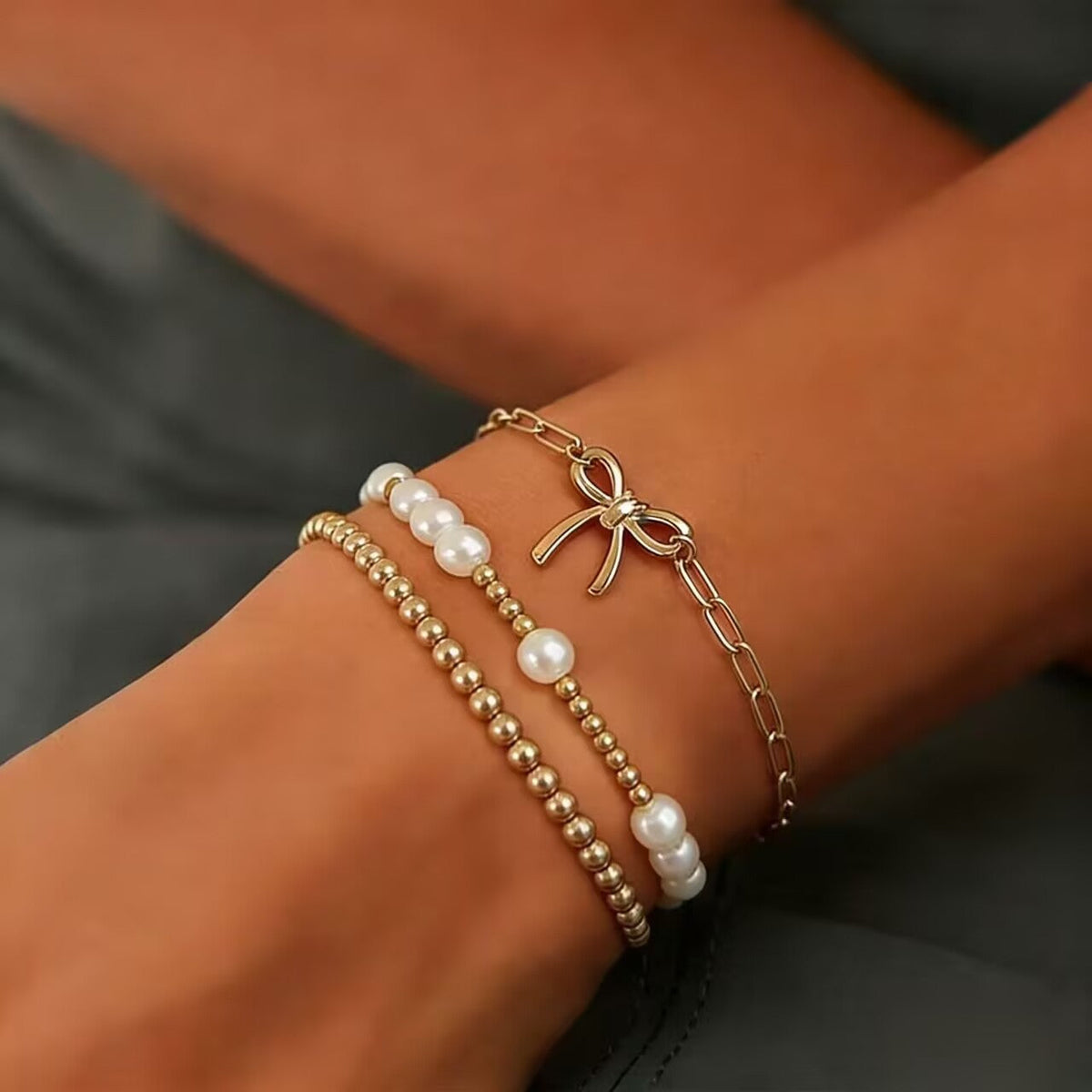 Minimalist Bow Pendant Bracelet with Pearl Accents